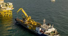 First export cable pull-in - Enshore Subsea’s CMOS Installer at Inch Cape’s offshore substation platform (Credit: Inch Cape Offshore)