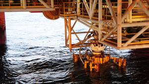 The damaged Blow Out Preventer (BOP), along with the Lower Marine Riser Package (LMRP) Cap from Deepwater Horizon. U.S. Coast Guard photo by Petty Officer 1st Class Thomas M. Blue.
