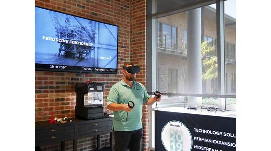 Danos lead competency assurance specialist Mark Theriot uses a virtual reality headset in Danos’ Tech Lab, where employees are encouraged to engage with new technologies to discover ways to incorporate them in their jobs. (Photo: Danos)
