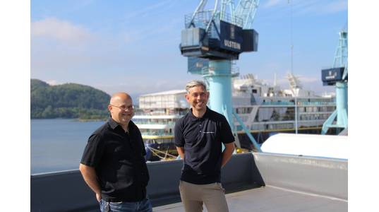 Frmo left: Ove Dimmen, sales manager at Ulstein Verft, and Rolf Ottar Rovde, sales manager at Ulstein Power & Control (Photo: Ulstein)