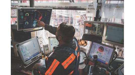 A driller interacts with the NOV drilling interface. (Source: NOV)