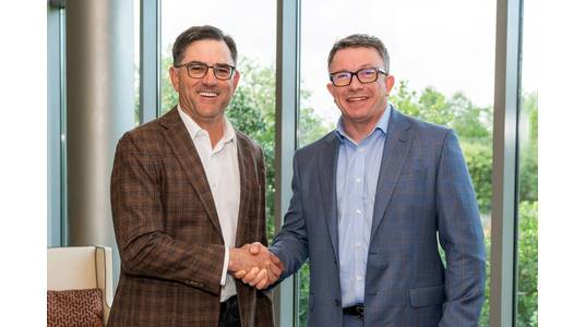 Halliburton Chairman, President & CEO Jeff Miller and Aker BP CEO Karl Johnny Hersvik agree to extend the companies' collaboration to develop a cutting-edge intelligent system to evolve field development planning. (Photo: Halliburton)