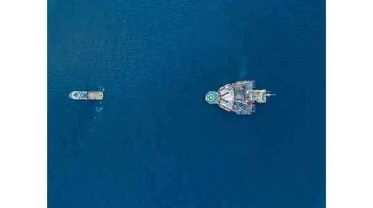 Illustration: Jack-up rig being towed - Credit: bomboman/AdobeStock