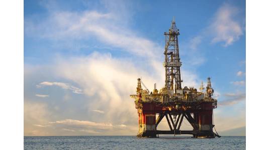 Illustration; An offshore drilling rig - Image by  Mike Mareen, Adobe Stock

