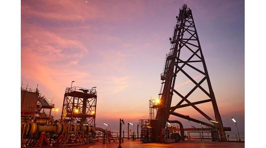 Illustration; A platform flare stack at dusk in India / Image by BP