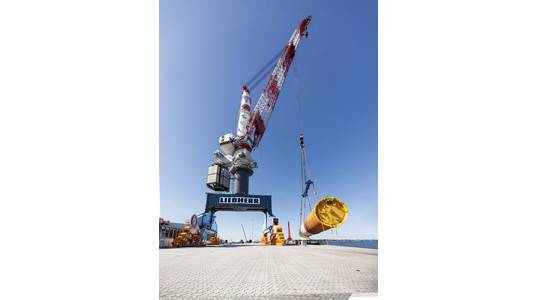 Liebherr TCC 78000 heavy-duty crane loads 72 monopiles for the largest Danish offshore wind farm "Kriegers Flak” / Image Credit: Liebherr