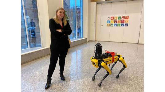 Minister of Petroleum and Energy Tina Bru delivering the HOD PDO approval to the Boston Dynamics developed robot dog Spot - Credit: Minister of Petroleum and Energy 