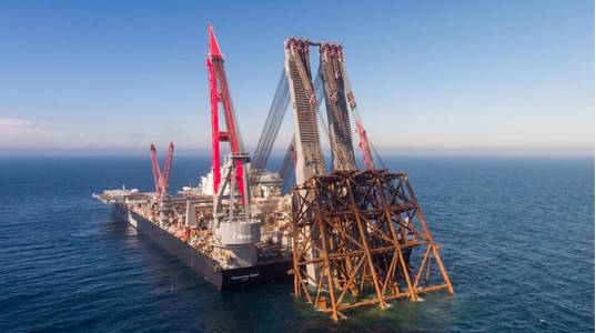 The Pioneering Spirit removing the Ninian Northern jacket - Credit: Allseas