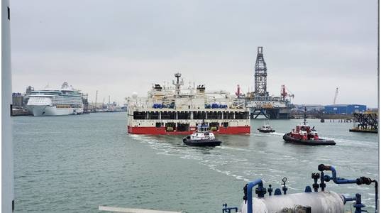 Ramform Titan heads into Galveston, guided by pilot vessels. Credit: PGS