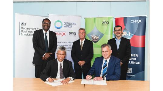 Left to right – Secretary of State Kwasi Kwarteng observes the signing between Zainal Abidin Abd Jalil and Rob Fisher of Ping Petroleum with Dan Jackson of Cerulean Winds and Tan Sri Syed of DNeX.Photo from Cerulean.