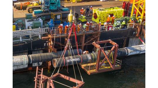 On September 10, 2021, the sections of the second Nord Stream 2 pipeline laid from the German shore and Danish waters was connected in a so-called above water tie-in. The opposing pipe strings were lifted from the seabed by the lay barge Fortuna and the pipe ends were cut and fitted together. The welding to connect the two lines took place on a platform located above the water on the side of the vessel. Then the connected pipeline was lowered to the seabed as one continuous string. ©Nord Stream 
