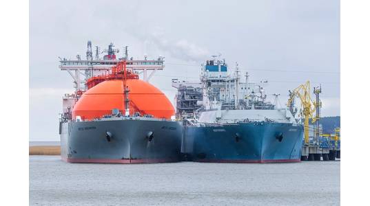 An LNG Tanker next to an FSRU unit - Image for illustration only  / Credit: KKF/AdobeStock