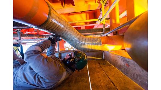 ICR technician performing a permanent repair using Technowrap engineered composite solution.

Credit: ICR Integrity Ltd