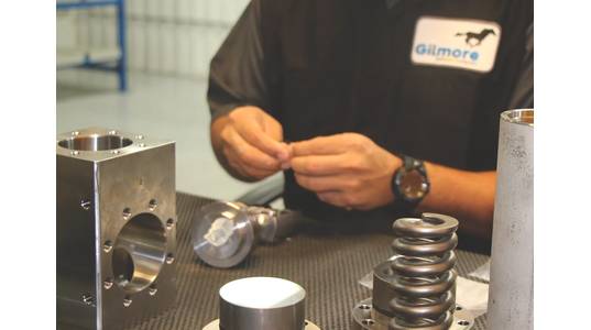 A technician works on a new regulator in Gilmore’s Houston facility. (Photo: Gilmore)