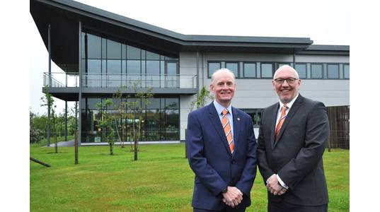 Well-Safe Solutions' Chief Technical Officer Glenn Wilson with Legal & Commercial Manager Graeme Murray outside the company's new Aberdeen headquarters (Photo: Well-Safe Solutions)