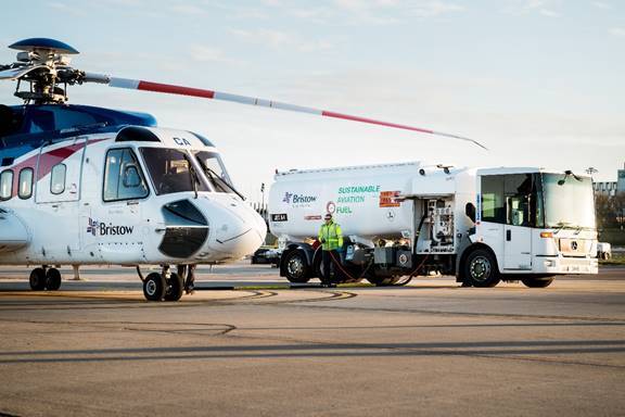 A Bristow S-92 is shown being refueled with sustainable aviation fuel at Aberdeen airport, marking one of the first SAF-powered flights to an offshore operation in the UK Continental Shelf.  