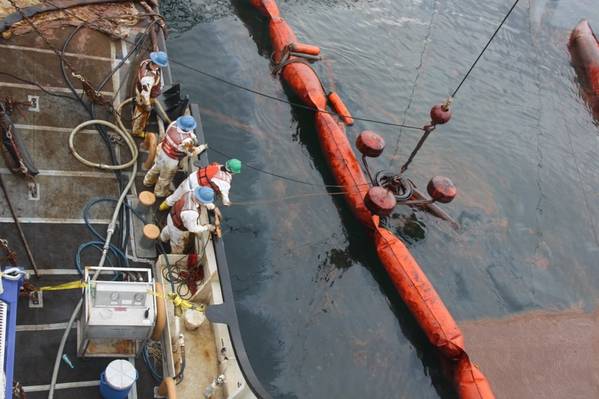Crewmembers on board Coast Guard Cutter Walnut deploy an oil skimmer into oil the ship collects in its inflatable boom, July 2, 2010. The Walnut, homeported in Honolulu, Hawaii has been temporarily redeployed to the Gulf of Mexico to aid in the BP Deepwater Horizon response. - Credit:  Deepwater Horizon Response/(CC BY-ND 2.0)

