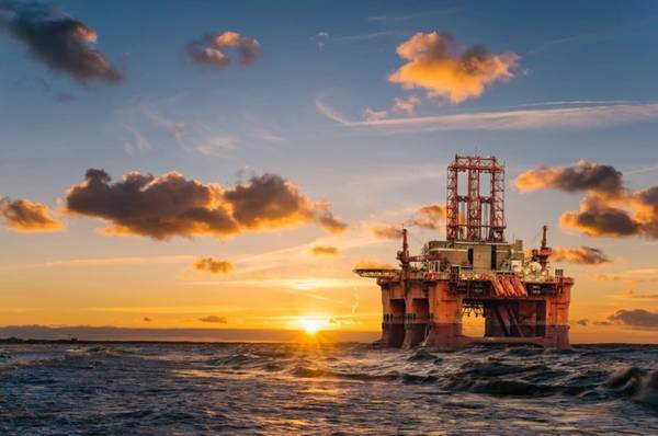 Illustration; An offshore drilling rig - Image by: Mike Mareen / Adobe Stock