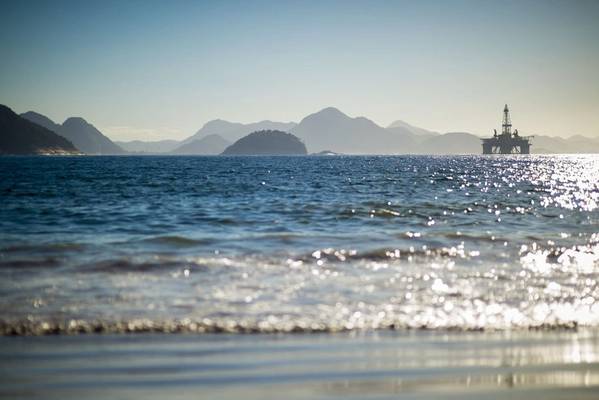 An offshore rig in Brazil - Credit: lazyllama/AdobeStock