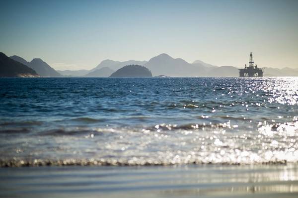 An offshore rig in Brazil - Credit: lazyllama/AdobeStock
