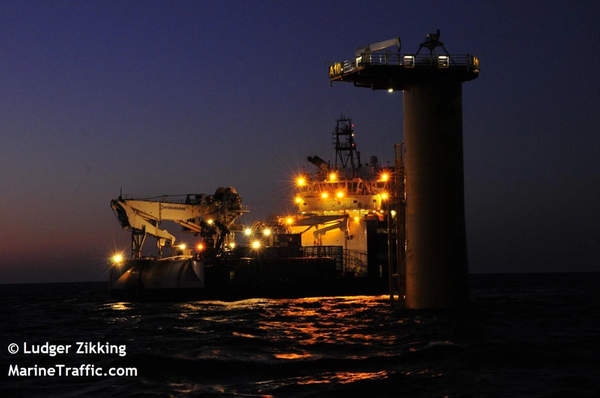 Olympic Triton vessel near an offshore wind monopiile - ©Ludger Zikking/MarineTraffic.com