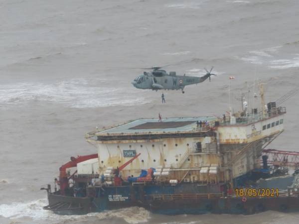 Photo shows rescue operation on another barge off India battered by the storm - Credit: Press Iinformation Bureau Maharashtra