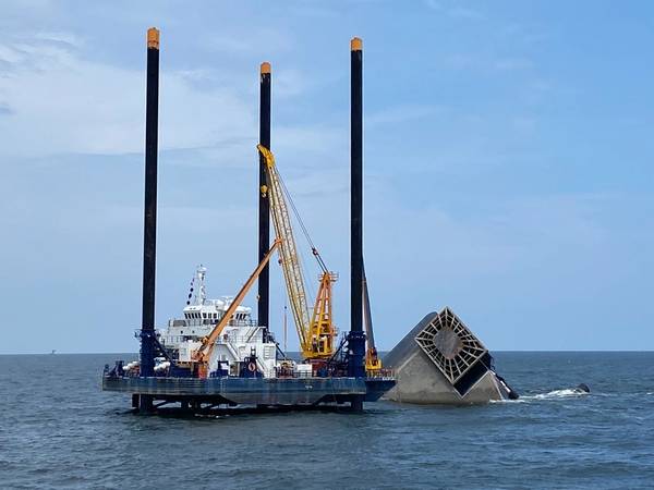 Responders conduct salvage and pollution response operations in the wake of the fatal Seacor Power capsizing. (Photo: Brendan Freeman / U.S. Coast Guard)