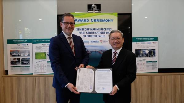 Sembcorp Marine President & CEO, Wong Weng Sun (right) receiving the certifications from Remi Eriksen, Group President & CEO of DNV GL. (Photo: Sembcorp Marine)
