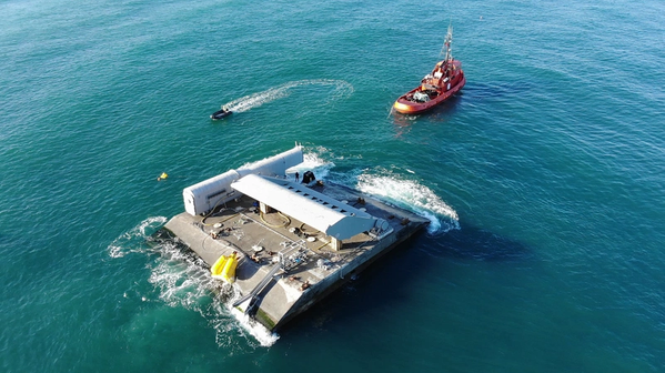 WaveRoller towed in to position off the coast at Peniche in Portugal. (Photo: AW-Energy) 