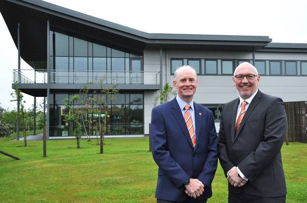 Well-Safe Solutions' Chief Technical Officer Glenn Wilson with Legal & Commercial Manager Graeme Murray outside the company's new Aberdeen headquarters (Photo: Well-Safe Solutions)