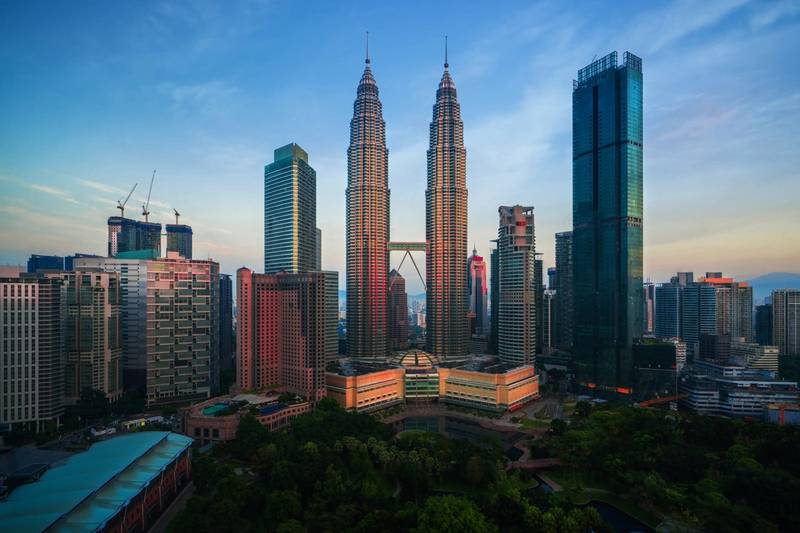 Petronas Q4 Profit Skids 21%