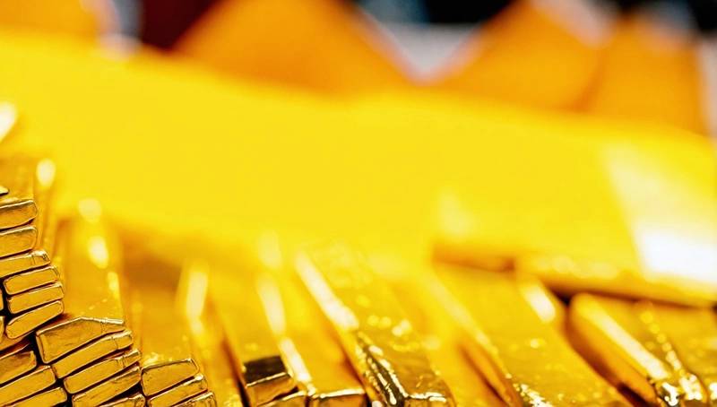 Gold nears record high as trade tensions boost demand for safe-haven assets