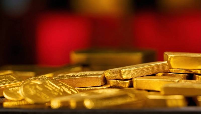 Gold reaches record levels as tariffs threaten to raise the price of gold.