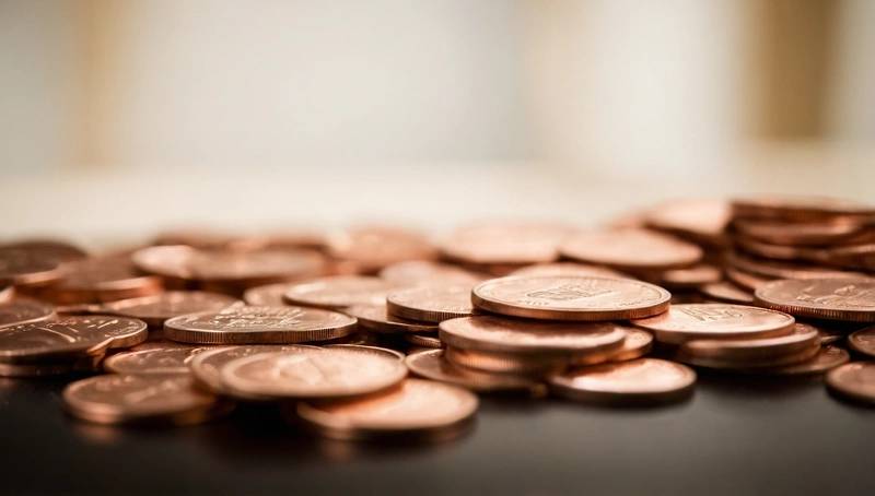 The gains in copper on a softer dollar are capped by uncertainty about tariffs