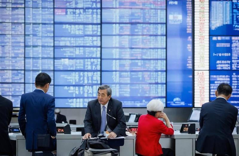 Asia markets temper Iran deal optimism, BOJ hikes rates