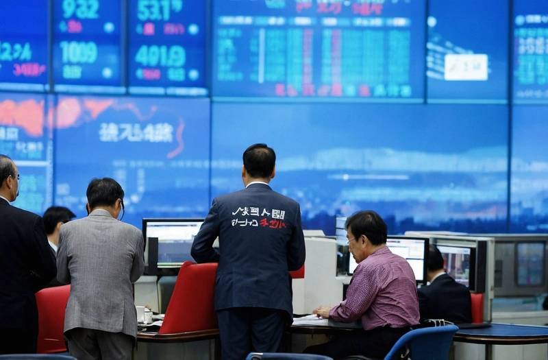 Asia markets temper Iran deal optimism, BOJ hikes rates