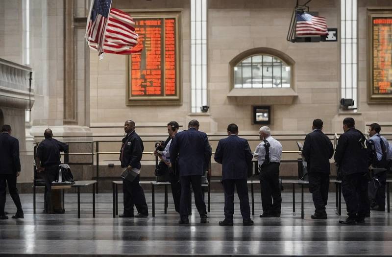 Stocks steady, oil continues to fall as traders await Warsh