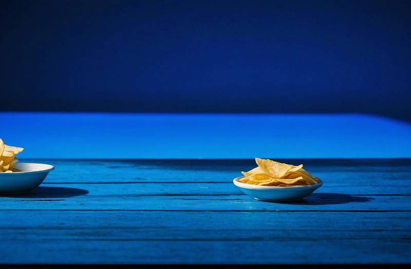 The chips in MORNING BID AMERICAS are blue