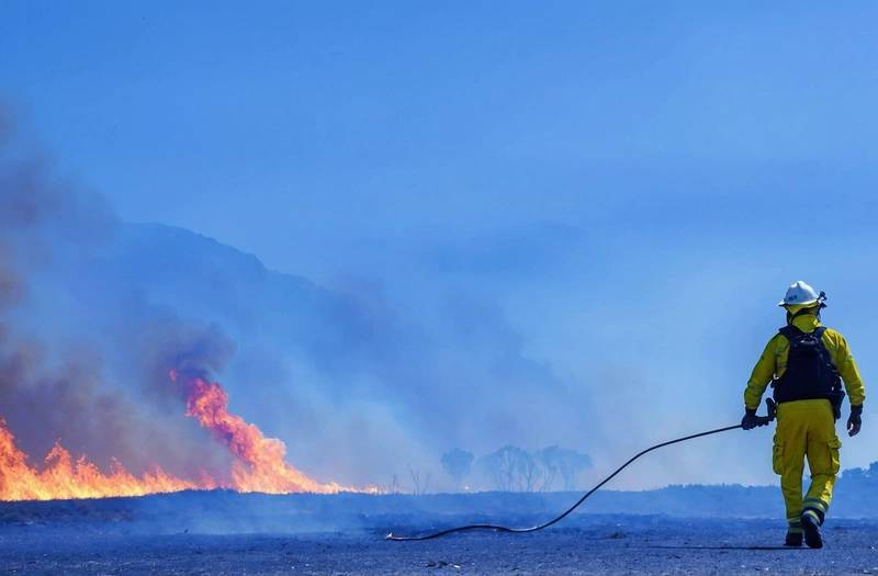 France and Spain battle to contain wildfires when temperatures soar once again