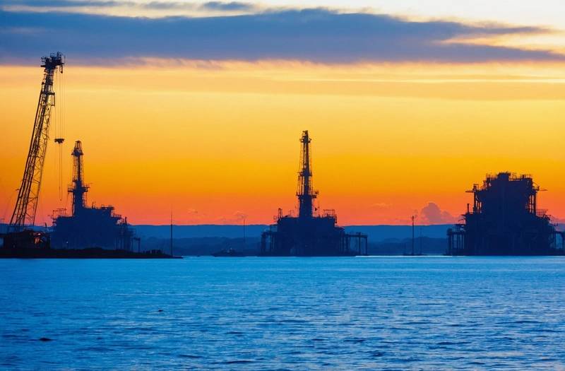 Oil reaches 5-week high; stocks jump with chipmakers