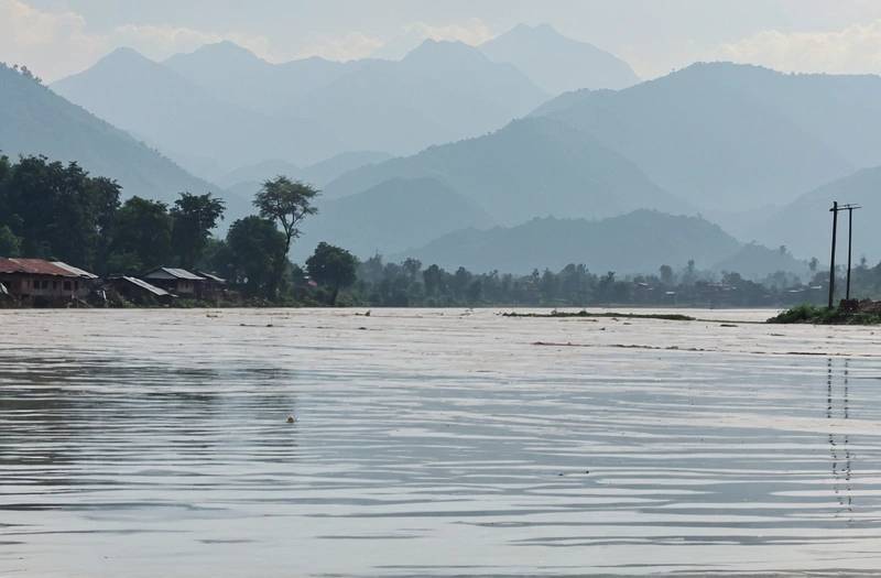 District official: Nepal lake's water level is rising and breaking its banks
