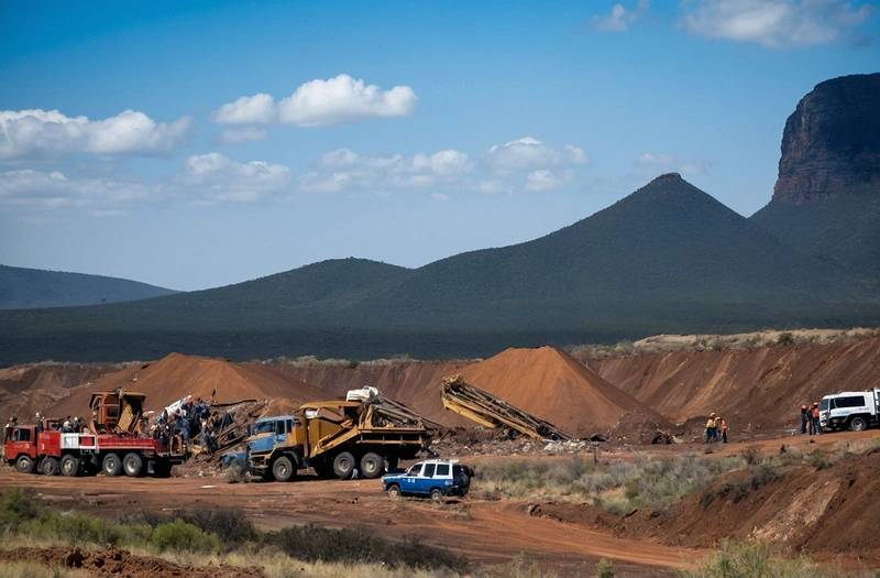 South Africa mine dump collapse kills 14 illegal miners, police say